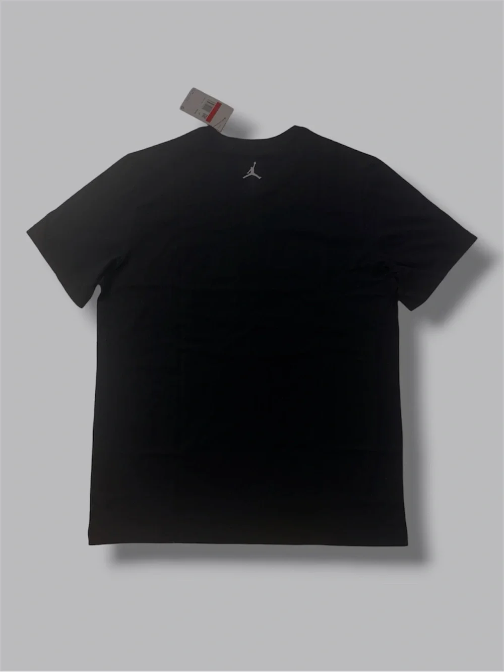 New! Jordan Flight Essentials T-Shirt sneakers floating in a cloudy sky (Large)